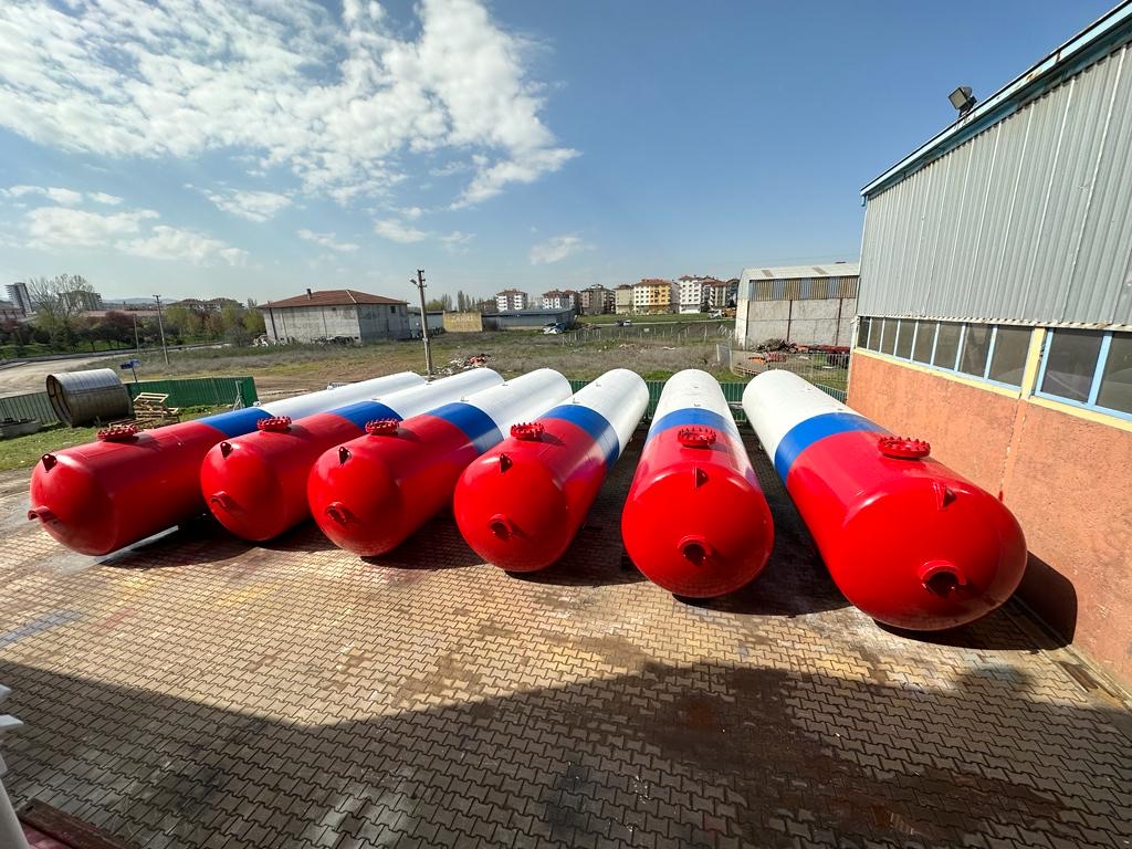 Red and white industrial pressure vessels for gas or liquid storage